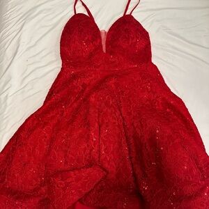 Red Backless Gown with Plunge Neckline and Spaghetti Straps
